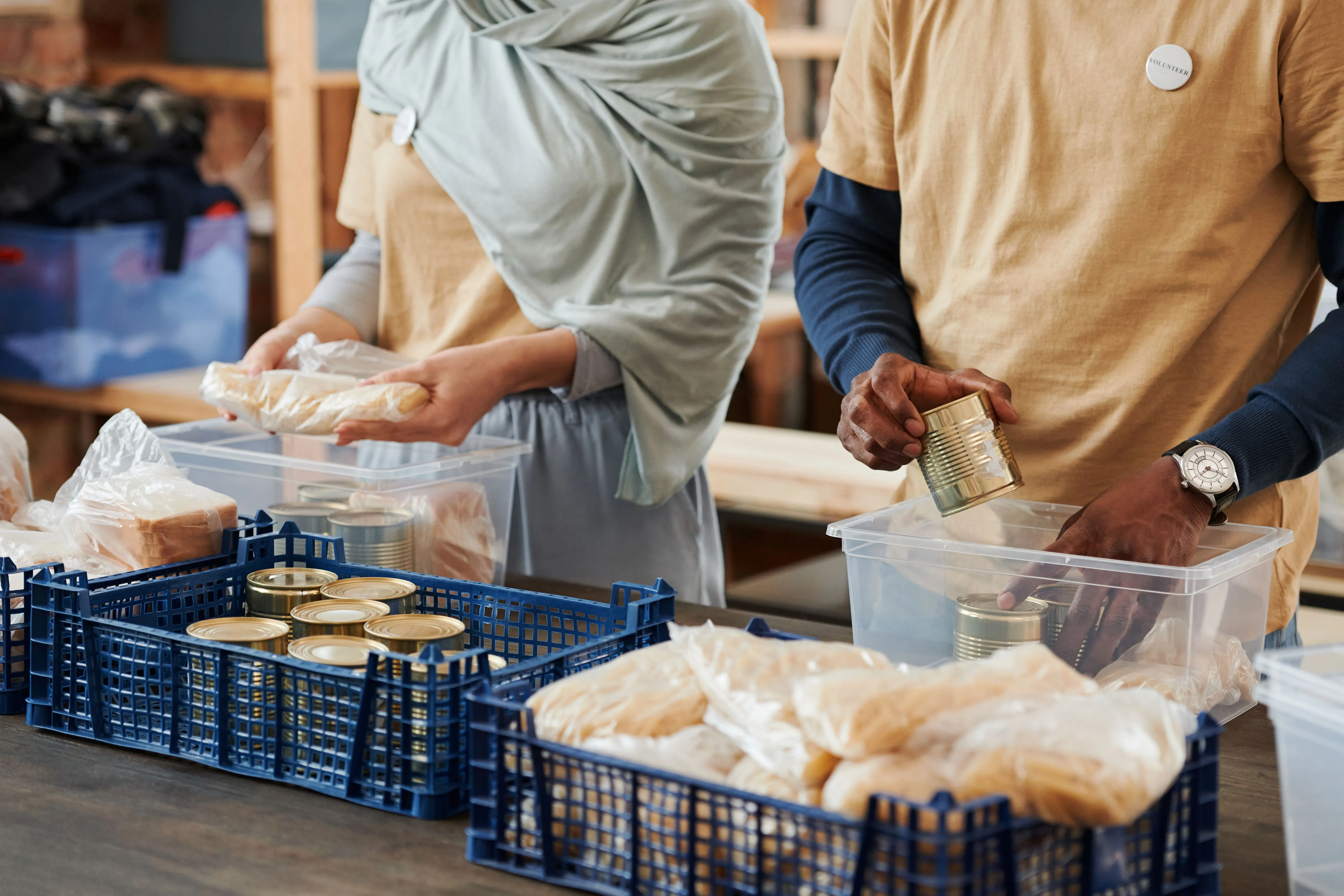 Community volunteers packing food hampers together